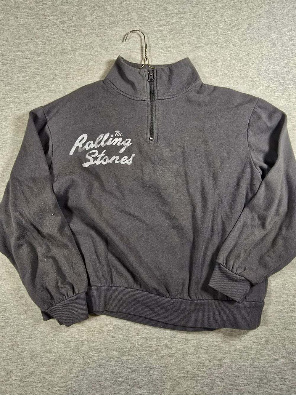 The Rolling Stones Quarter-Zip Crop Sweatshirt with Checkered Tongue Graphic